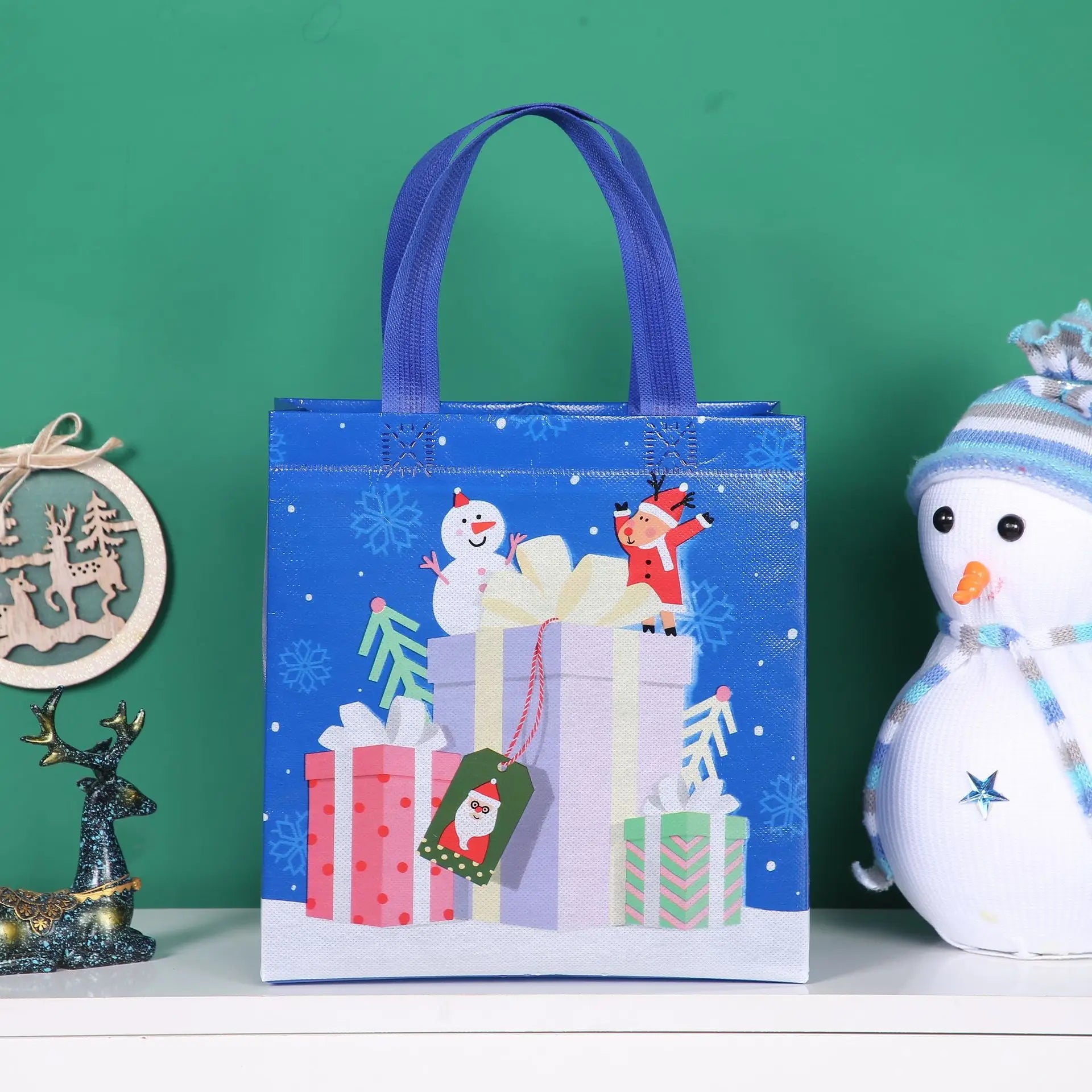 2024 New in Christmas Gift Bags Cartoon Cute Santa Elk Snowman Printing Non Woven Handbag Hot Pressing Party Supplies Ornaments